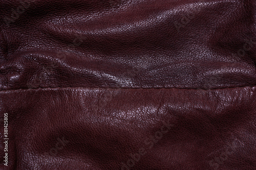 Dark grunge background of brown genuine  leather © Nadiia