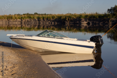 boat on the quiet river photo