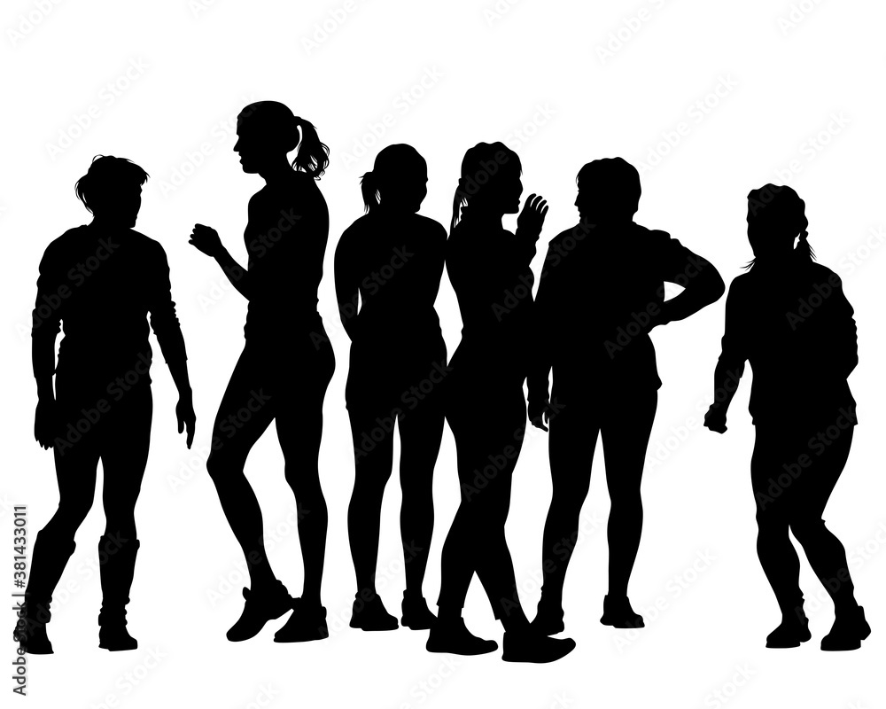 Group of young women in fashionable clothes are standing on the street. Isolated silhouettes on white background