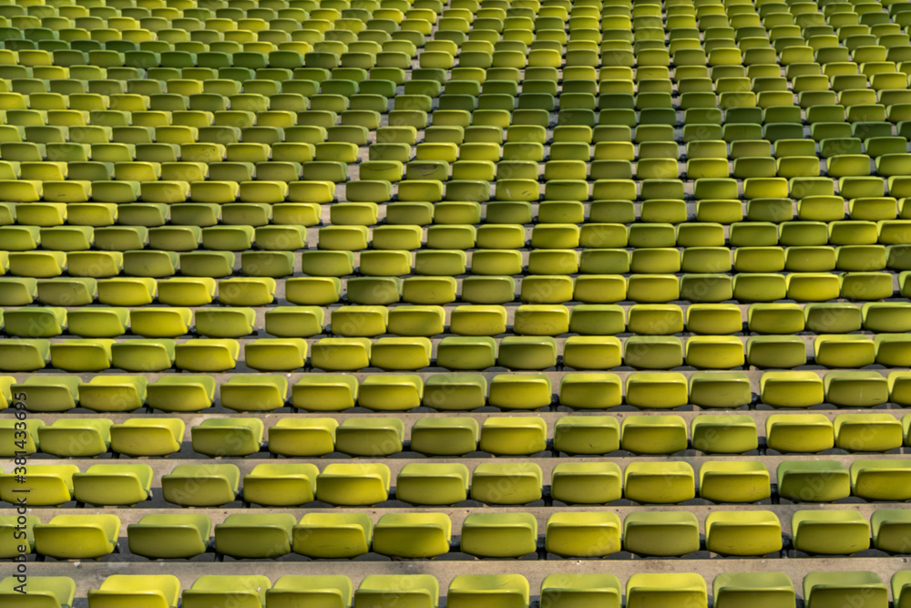 Fototapeta premium endless rows of enpty chairs in a stadium