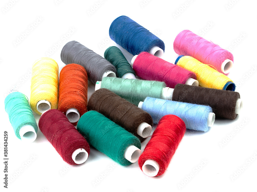 Coils of colored thread on a white background Coils of colored thread on a white background