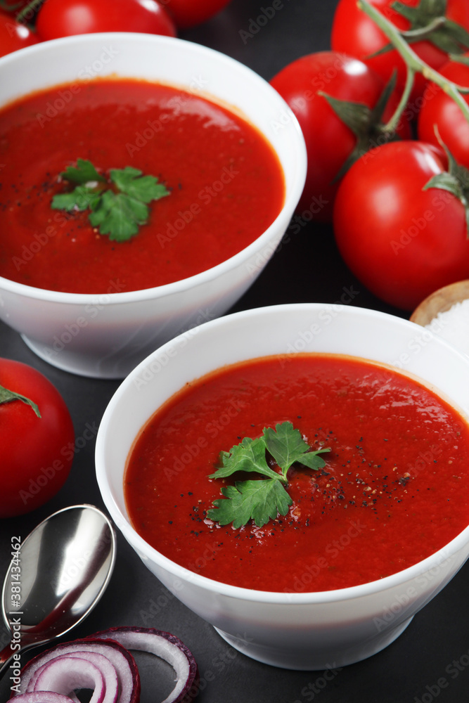Two plates with gazpacho - traditional Spanish tomato soup Two plates with gazpacho - traditional Spanish tomato soup