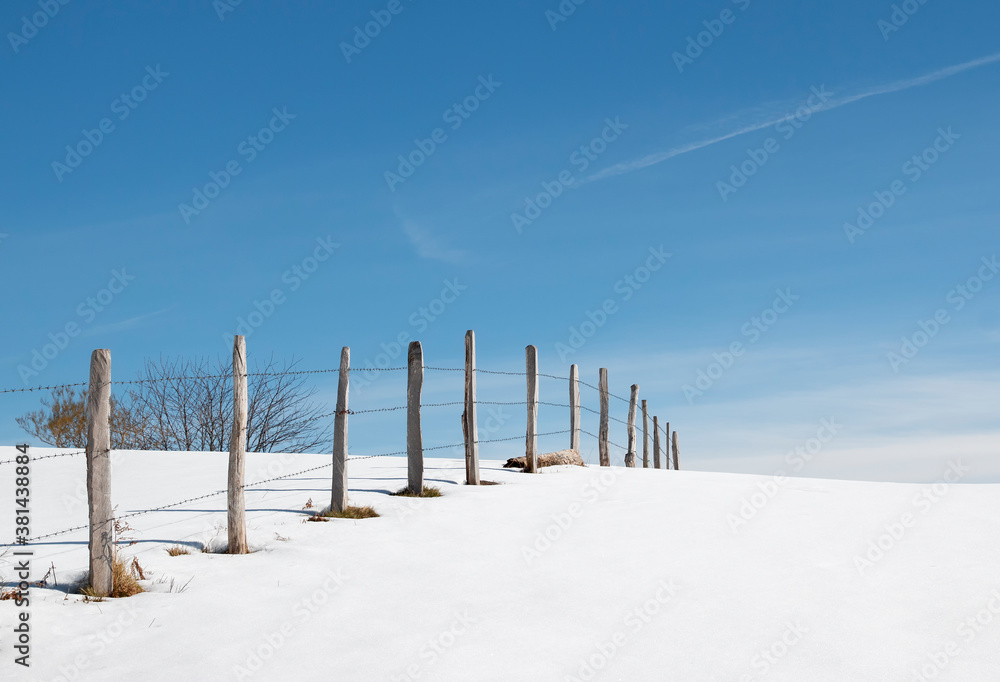 Snowy horizon with a fence Snowy horizon with a fence