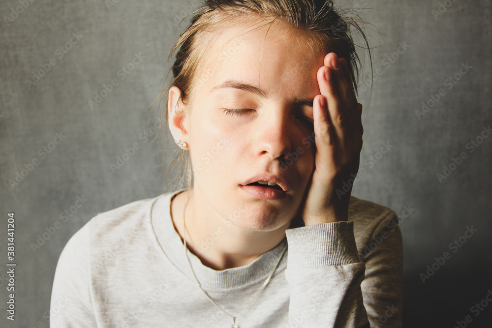 The girl is tired. Emotional girl. Facial emotions The girl is tired. Emotional girl. Facial emotions
