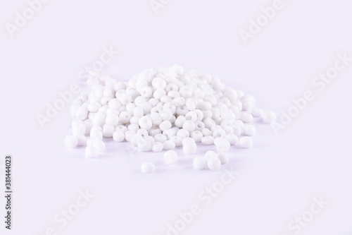 Beads spread on white background. Background or texture of beads. Close up, macro,It is used in finishing fashion clothes. make bead necklace or beads for woman of fashion,Bead Crochet. Daily Beading.