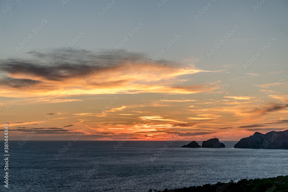 Panorama of a beautiful sunset over the sea off the coast of Ponza, the largest island of the Italian Pontine Islands archipelago
