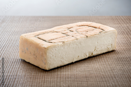 Tableau sur toile Italian aged cheese on wooden background