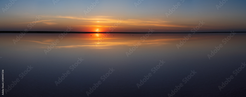 Naklejka premium Sunset Genichesk pink salty lake panorama, Ukraine