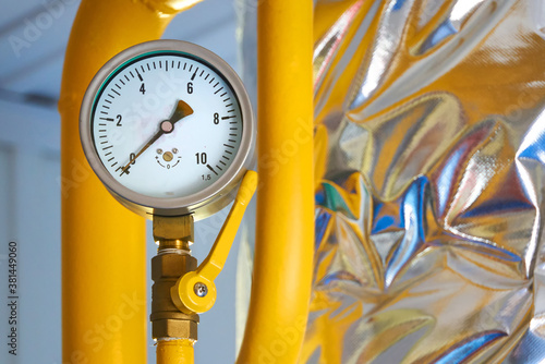 Pressure sensors on the gas pipeline painted in yellow.