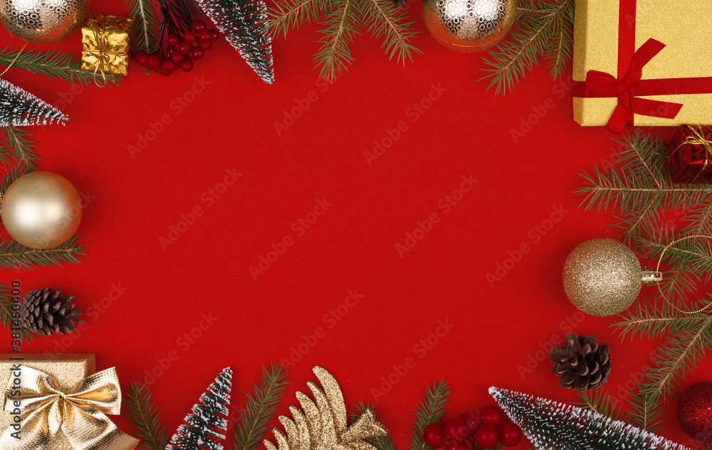 Frame of Christmas decorations on a red background.Flatly, CopySpace Frame of Christmas decorations on a red background.Flatly, CopySpace