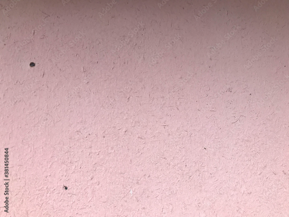 Fototapeta premium natural texture. pink painted background. against the background of inverted numbers. natural natural texture. painted stone, unusual and stylish background for creating a picture