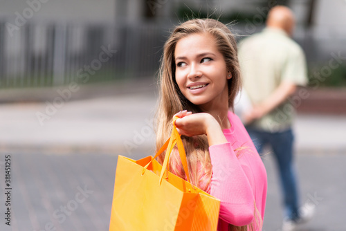 Woman holding shopping bags © Minerva Studio