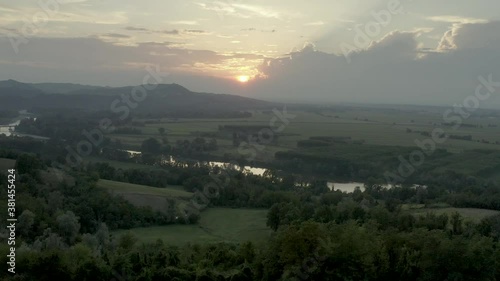 Wallpaper Mural Landscape on Po river and vegetation at sunset, aerial view, Monferrato, Northern Italy.  Torontodigital.ca