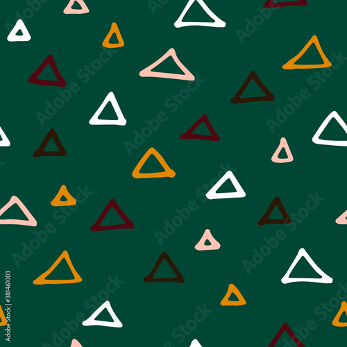Seamless abstract doodle pattern. Fall colored hand drawn triangles on green background. Scandinavian cozy ornament. Vector geometric autumn illustrations for wallpaper  poster  wrapping paper  fabric