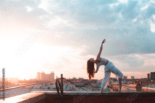  girl dancing on the roof