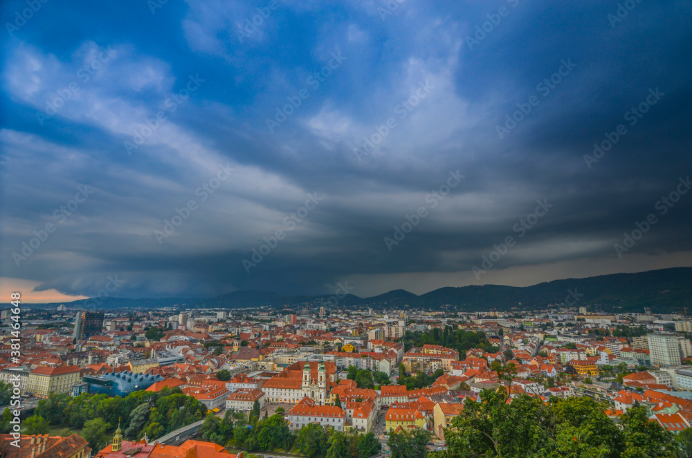 Storm with dramatic clouds looking like a tornado over the city of Graz, Styria region, Austria