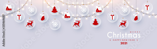 Merry Christmas and Happy New 2021 Year design template with glossy balls, light garland, snowflakes and nordic toys