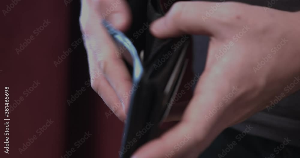 Man showing an empty wallet Man showing an empty wallet