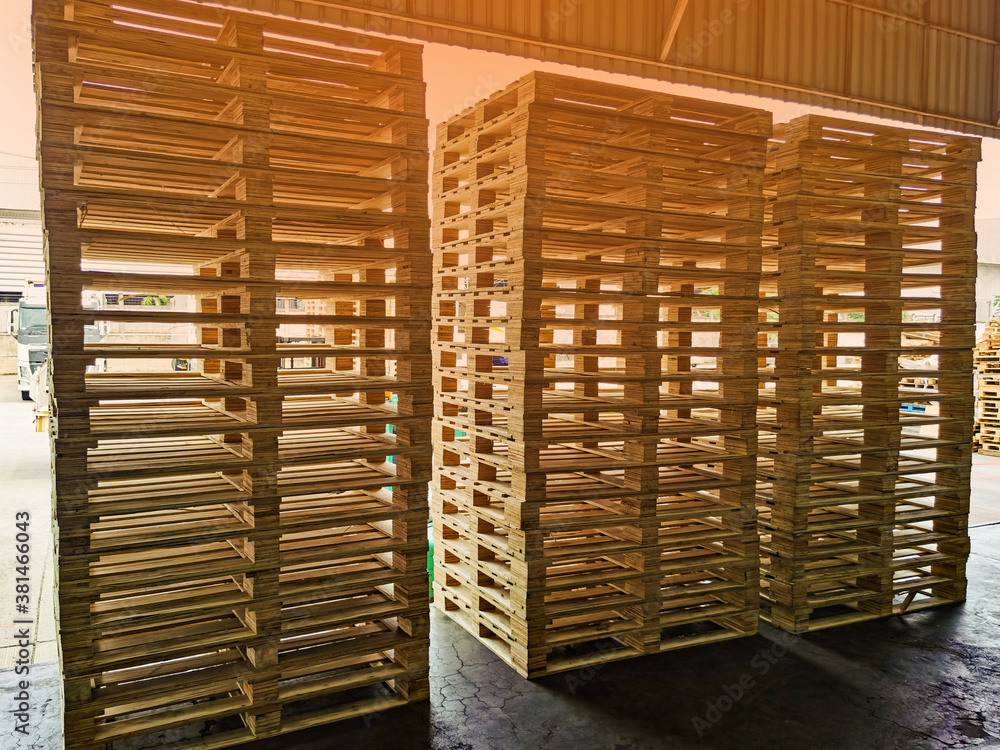 Wooden pallets stack in warehouse cargo storage, shipment in logistics and transportation industrial, wood pallets heap, delivery service Wooden pallets stack in warehouse cargo storage, shipment in logistics and transportation industrial, wood pallets heap, delivery service