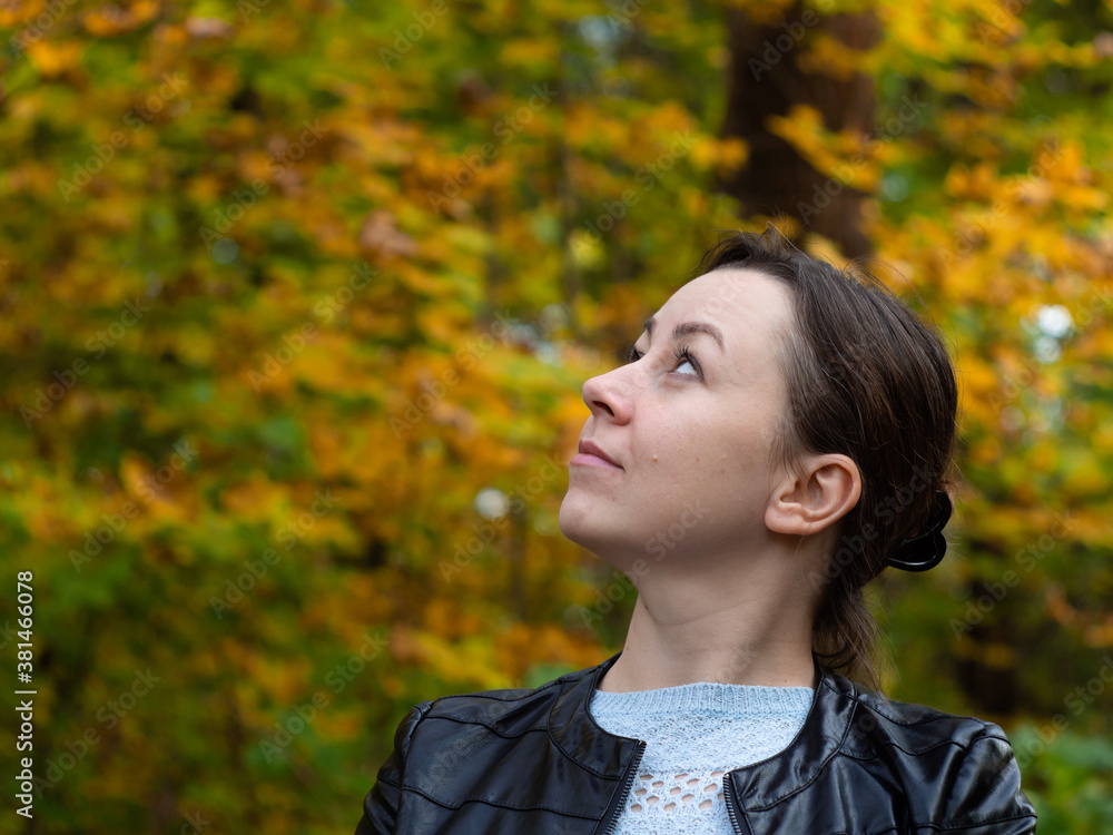 girl on a walk in the Park. the yellow foliage. autumn. Wellness walks in the fresh air. girl on a walk in the Park. the yellow foliage. autumn. Wellness walks in the fresh air.