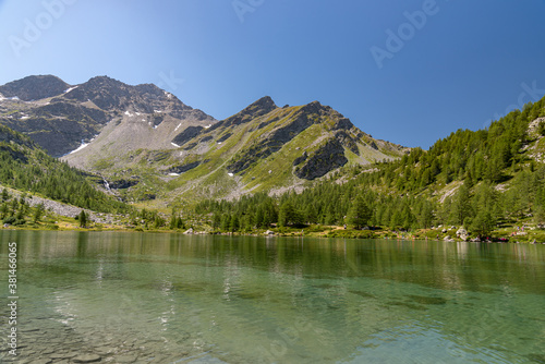 Schilderij op canvas Morgex (Aosta), the wonderful Lake of Arpy, a mirror of water of glacial origin set in a beautiful alpine setting