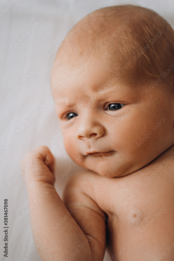Portrait of adorable newborn baby girl, enjoy meeting a world, birth and childhood concept Portrait of adorable newborn baby girl, enjoy meeting a world, birth and childhood concept