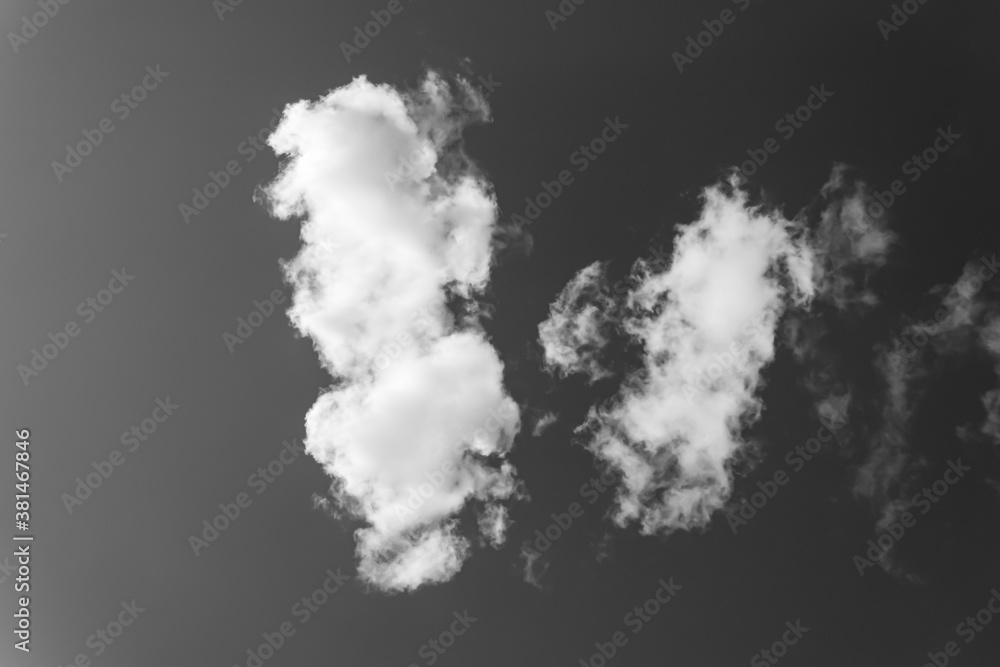 Black and gray sky and white clouds.