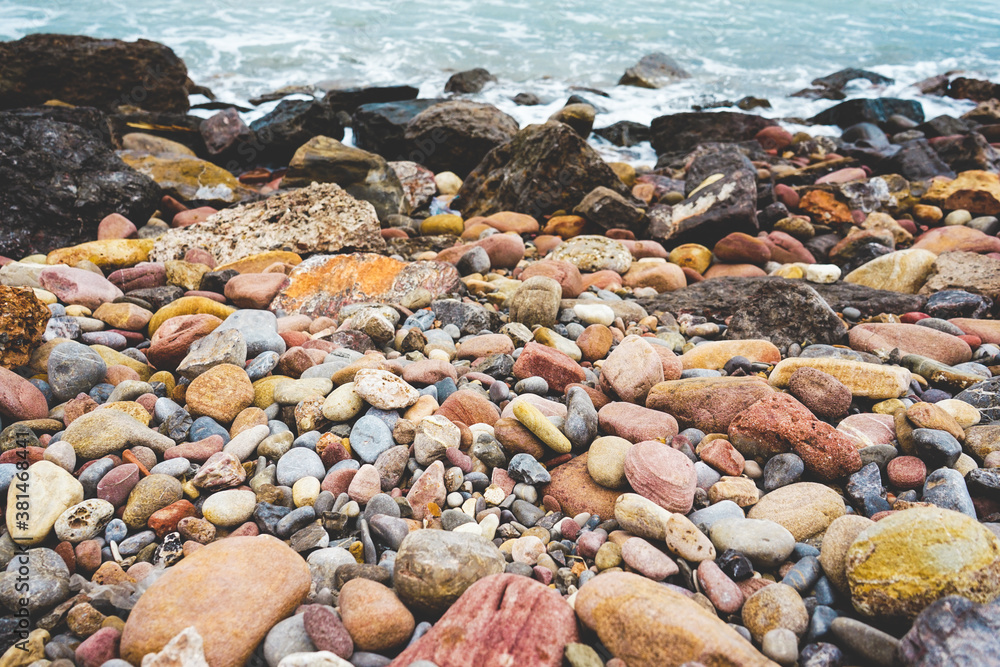 Variety of stones in a stone shore in the coast Variety of stones in a stone shore in the coast
