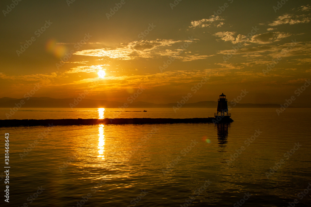 Fototapeta premium Burlington Breakwater Lighthouse at Sunset