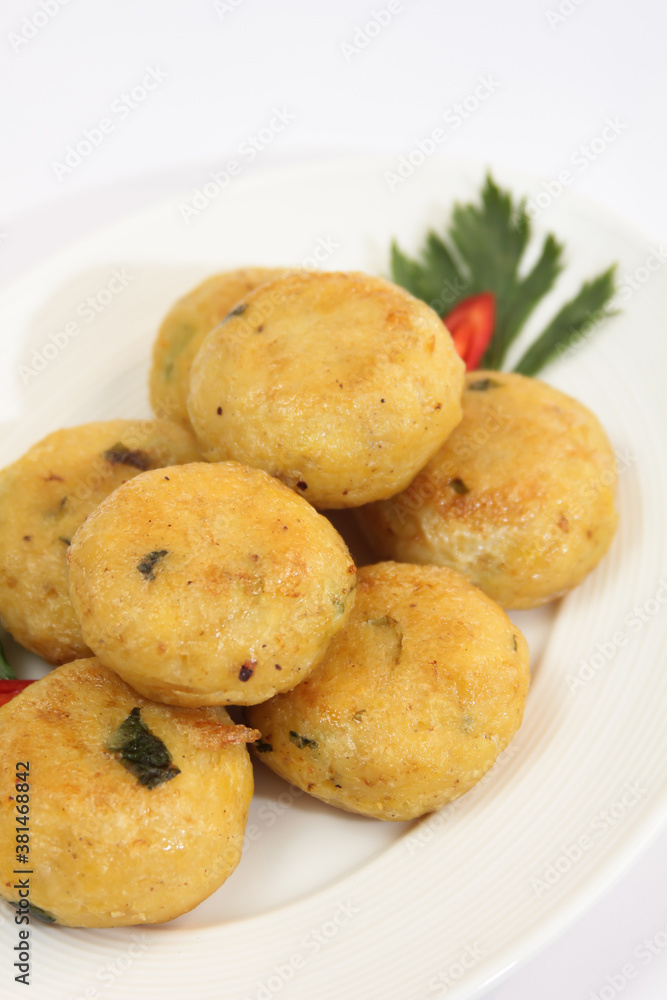 Pergedel is Indonesian fried patties, made of ground potatoes and minced meat. Most common perkedel are made from mashed potato. 