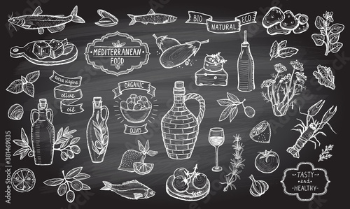 Mediterranean traditional food collection on a chalkboard background