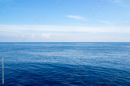 Horizon of calm splendid blue sea  peace and relaxation concept. Soft focus