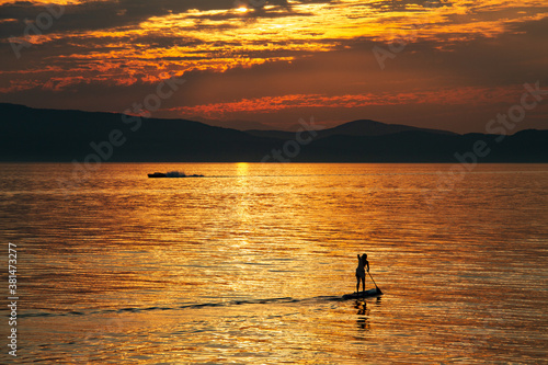 Paddleboater on Lake Champlain at Sunset in Vermont