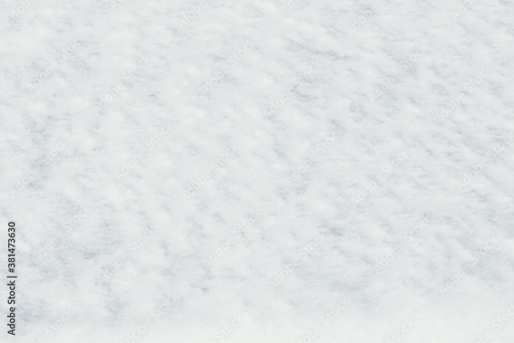 Winter background with pure white snow on the ground