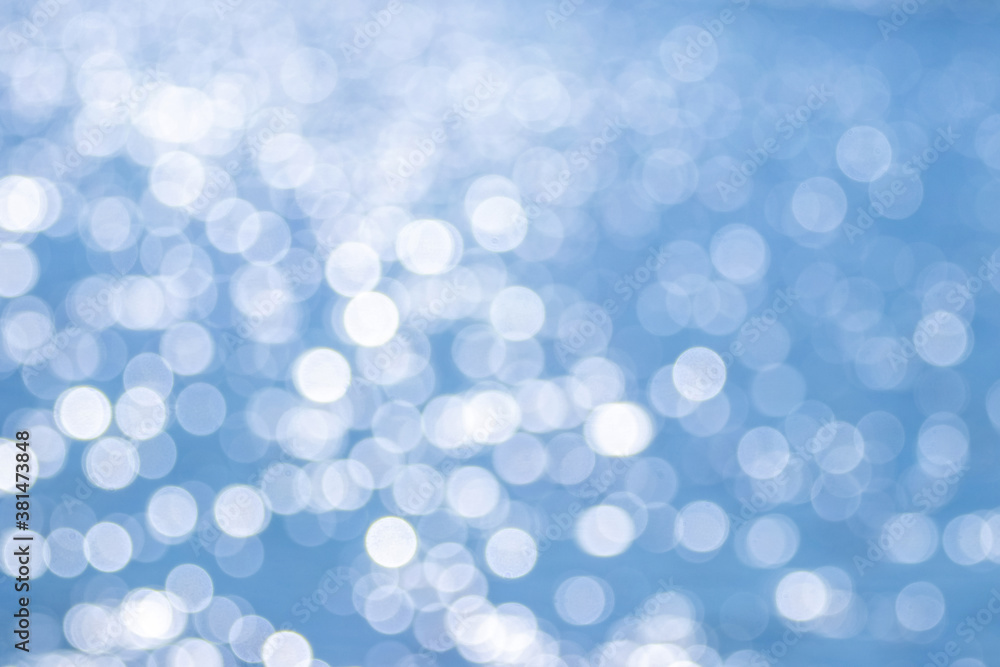 Abstract background with white and blue glitter. Christmas background