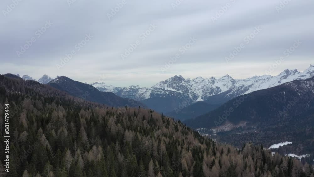 aerial snow covered mountain peaks in alps at winter aerial snow covered mountain peaks in alps at winter