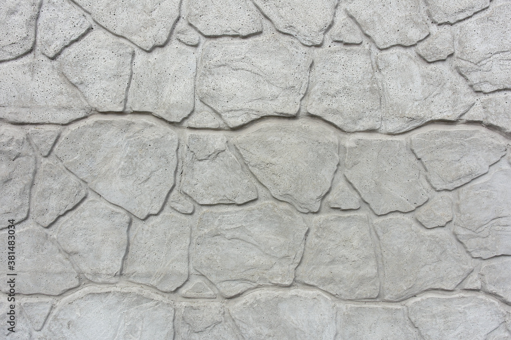 Textured with a pattern, the background of the stone wall is gray Textured with a pattern, the background of the stone wall is gray