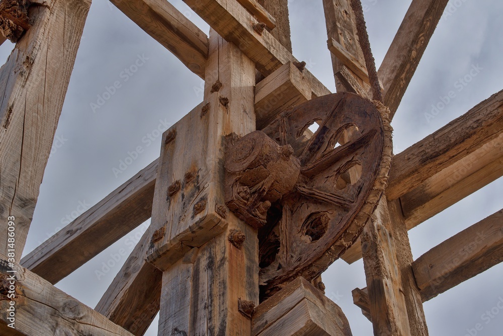 Detail of a wooden wheel of an old cable car. Detail of a wooden wheel of an old cable car.