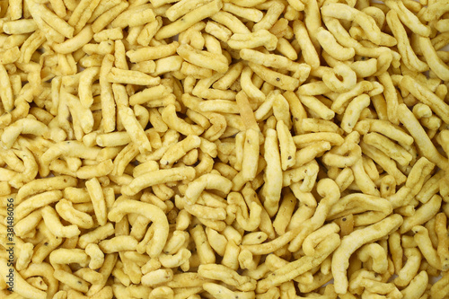 Indian snacks food gathiya sev as background texture.