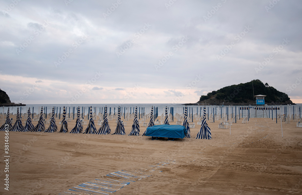 Typical umbrellas of Ondarreta beach