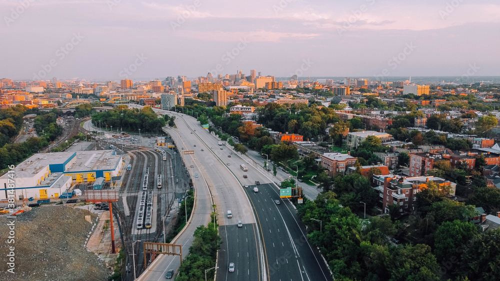 Aerial view of Baltimore City from the highway with cars driving on the street
