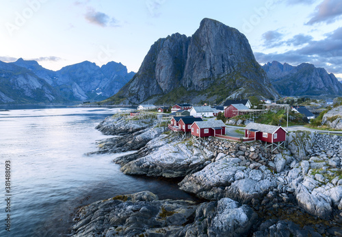 Famous tourist attraction Hamnoy fishing village on Lofoten Islands, Norway with red rorbu houses, in summer. © minoandriani