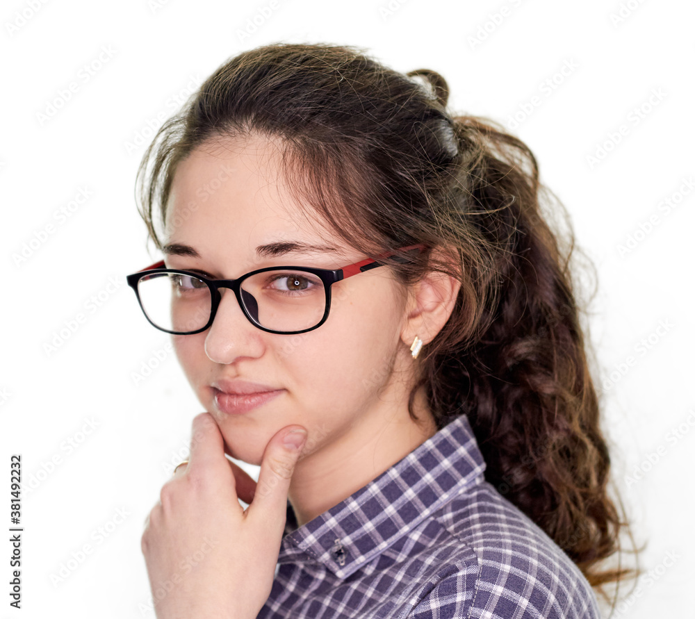 young girl in a shirt on a white background, difficult choice of profession young girl in a shirt on a white background, difficult choice of profession