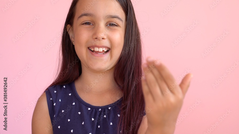 Little girl showing the writing on the wall Little girl showing the writing on the wall