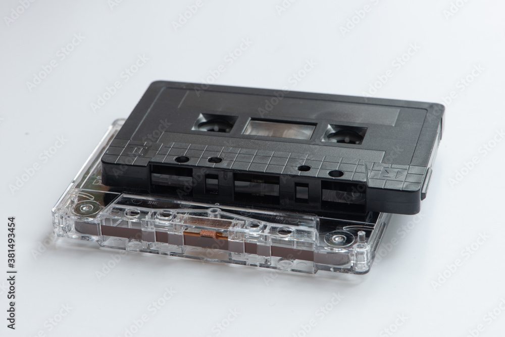 Retro plastic cassettes tape from 70s 80s 90s. Concept of music history. Retro plastic cassettes tape from 70s 80s 90s. Concept of music history.