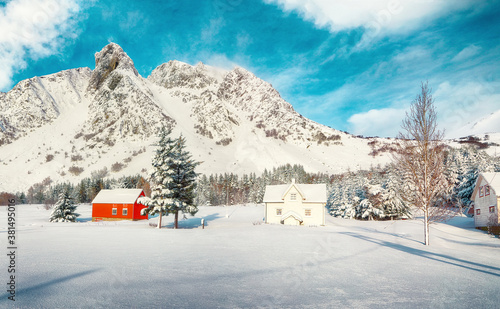 Astonishing winter scenery with traditional Norwegian wooden houses and pine trees near Valberg village at Lofotens.
