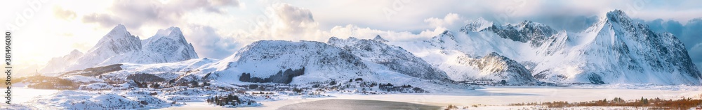 Breathtaking winter scenery over Bostad village and Torvdalshalsen lake seen from Torvdalshalsen.