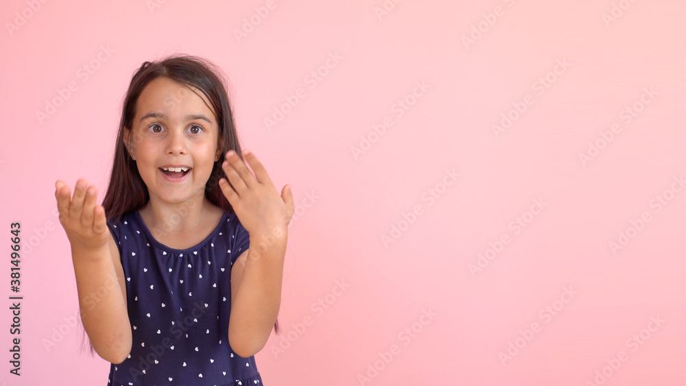 Girl playing hide and seek portrait. Cute little girl open her face with hands. Playing hide and seek Girl playing hide and seek portrait. Cute little girl open her face with hands. Playing hide and seek