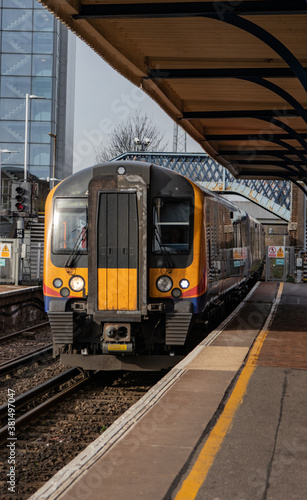 a train arriving at a train station or platform