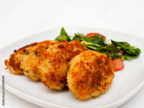 Pasteis de bacalhau - portuguese cod fritters with salad